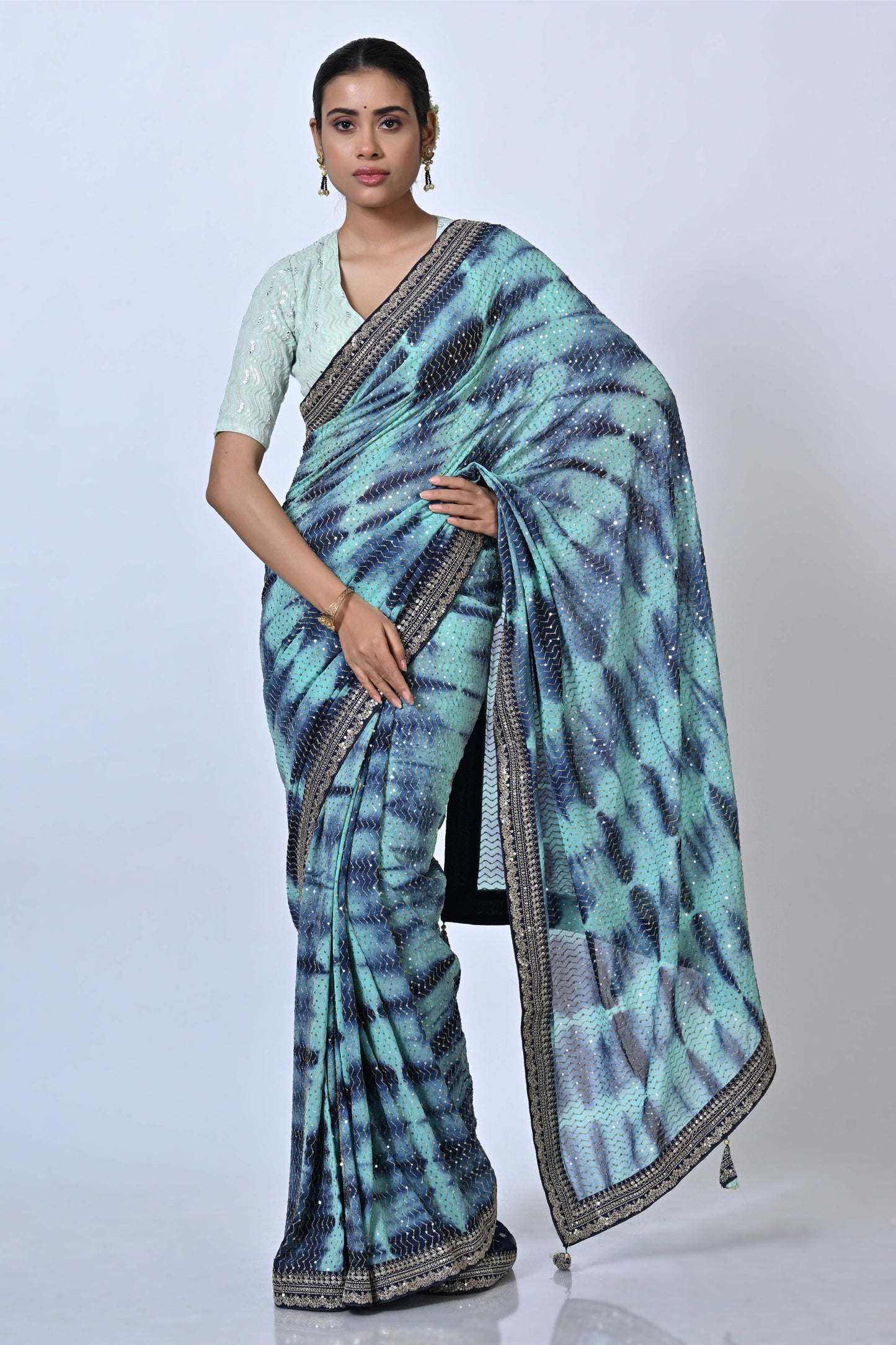 Georgette Saree With Deep Dye And Sequence Embellishment